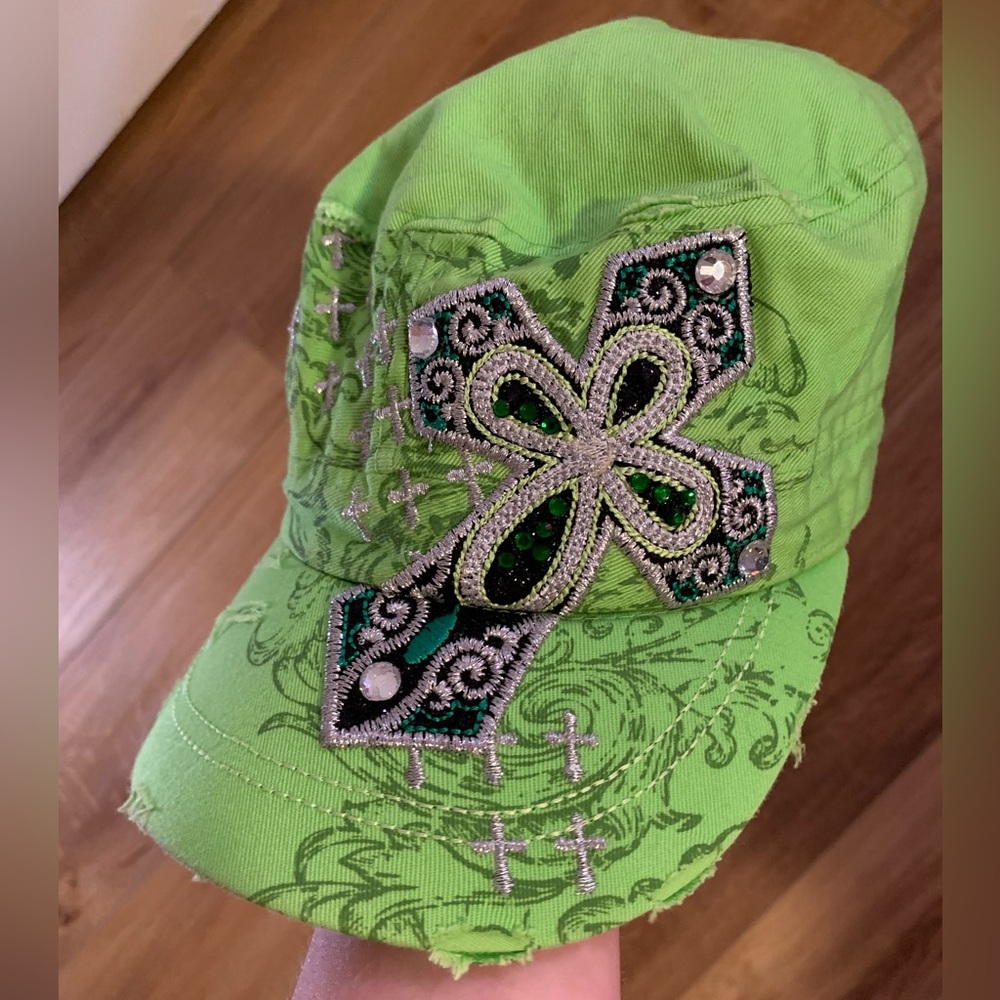 Blinged out green and silver Leader Brand cross hat with scuffing
